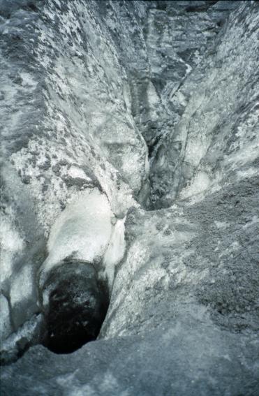 A hole in the glacier from which the sound of rushing water could be heard
