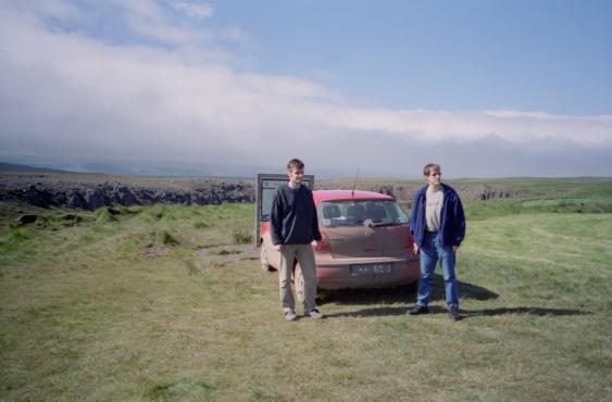 Gordon and Dave by the dust-covered car