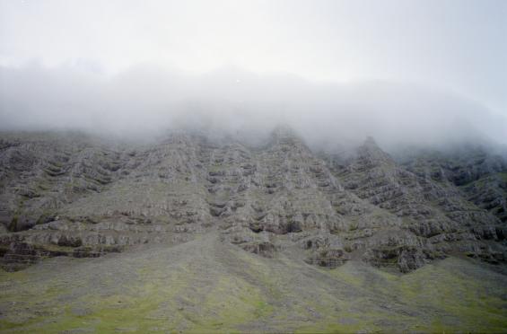Rockfaces covered in low cloud and mist