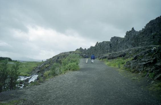 Gordon and Dave walking down the path at Þingvellir